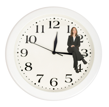 business woman sitting on clock
