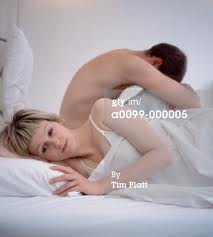 stresssed couple in bed